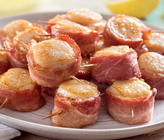 Гребешки запечённые в беконе