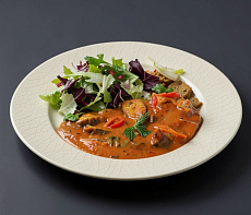 Стерлядь по-матросски с томатным соусом